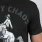 Close-up of a person wearing a dark charcoal heather t-shirt with a graphic print of a cowboy riding a bucking horse and the text 'MY CHAOS' in gray.