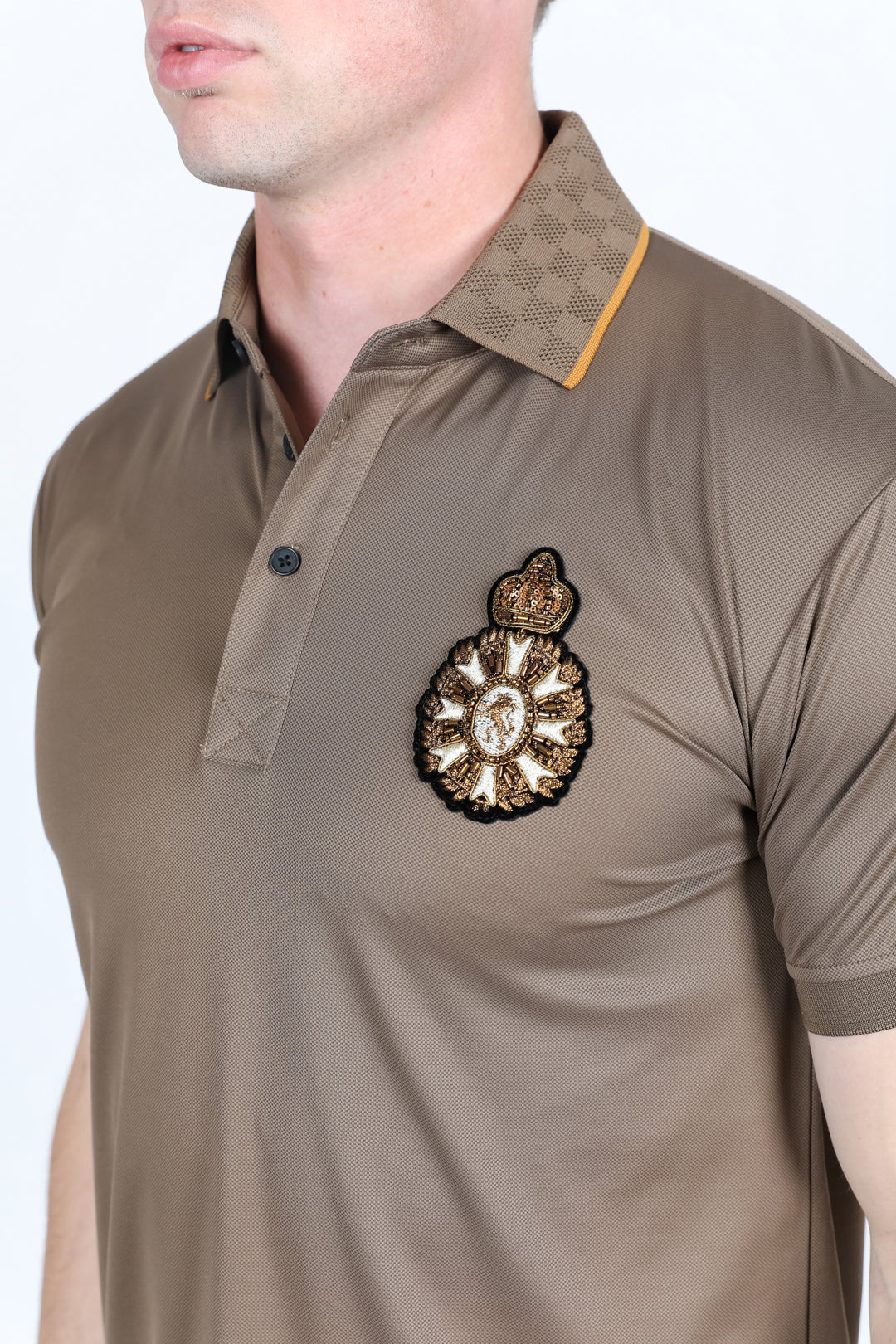 beige royal crest polo detail platini