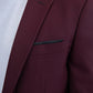 Close-up of a burgundy blazer with a white shirt underneath