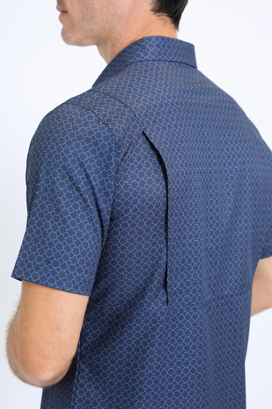 Man wearing a navy western aztec performance shirt close up back