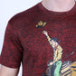 A close-up of a man wearing a short-sleeve crewneck t-shirt with a red and black heathered texture. The shirt features a graphic print of a cowboy riding a bucking bronco, with a yellow hat flying off.