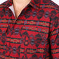 Man wearing a red western aztec performance shirt close up front