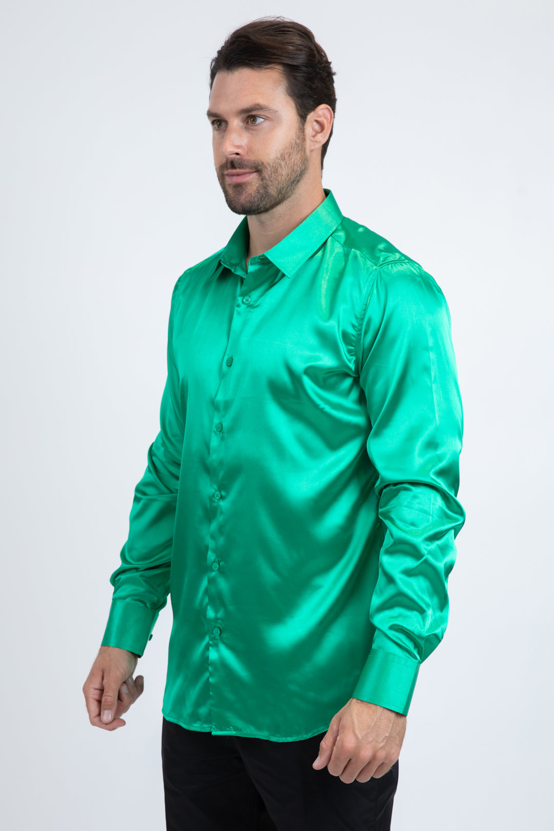 Man wearing a green satin shirt on a white background