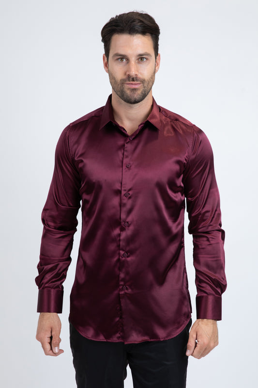 Man wearing a burgundy satin shirt on a white background