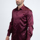 Man wearing a burgundy satin shirt on a white background