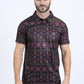 Man wearing a patterned shirt on a white background