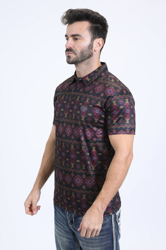 Man wearing a patterned shirt on a white background